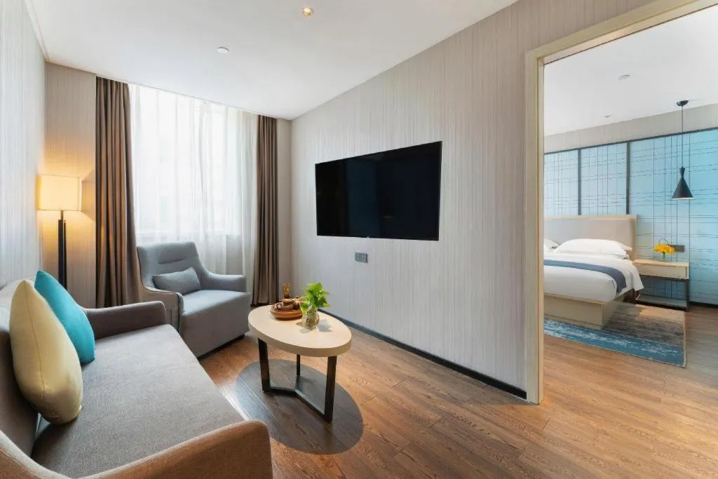 Bed in Echarm Hotel Guangzhou Changlong Shiqiao Metro Station