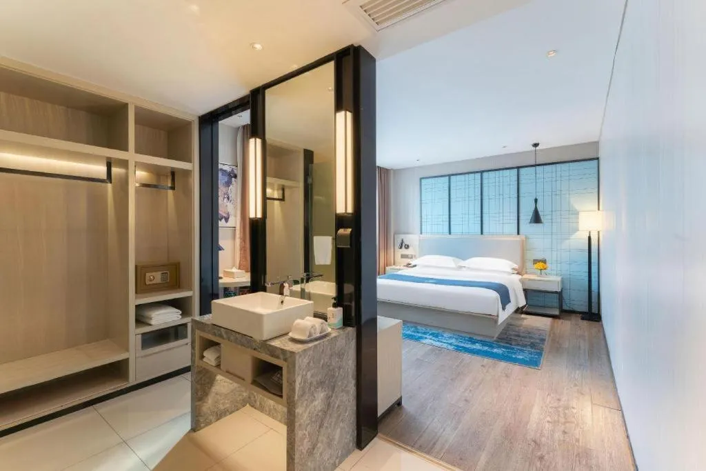 Bed in Echarm Hotel Guangzhou Changlong Shiqiao Metro Station