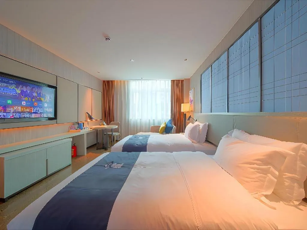 Bed in Echarm Hotel Guangzhou Changlong Shiqiao Metro Station