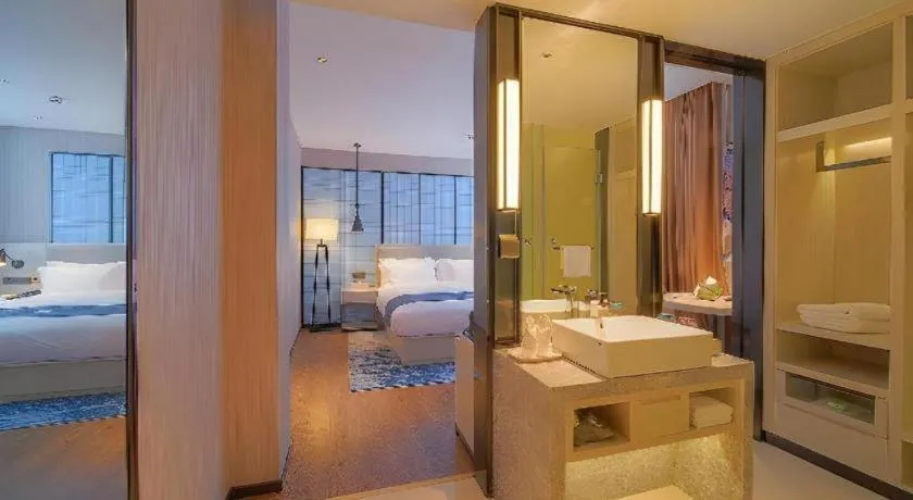 Bed in Echarm Hotel Guangzhou Changlong Shiqiao Metro Station