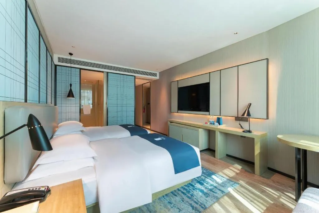 Bed in Echarm Hotel Guangzhou Changlong Shiqiao Metro Station