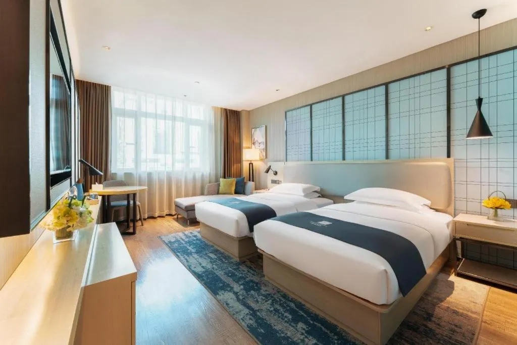 Bed in Echarm Hotel Guangzhou Changlong Shiqiao Metro Station