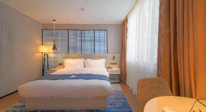 Bed in Echarm Hotel Guangzhou Changlong Shiqiao Metro Station