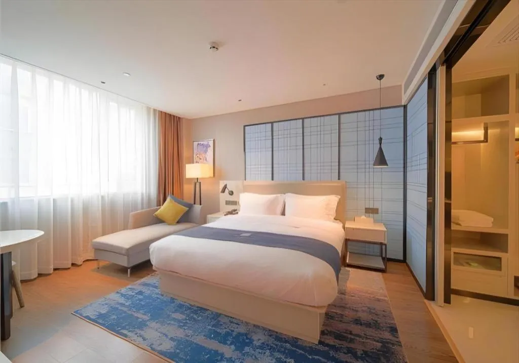 Bed in Echarm Hotel Guangzhou Changlong Shiqiao Metro Station