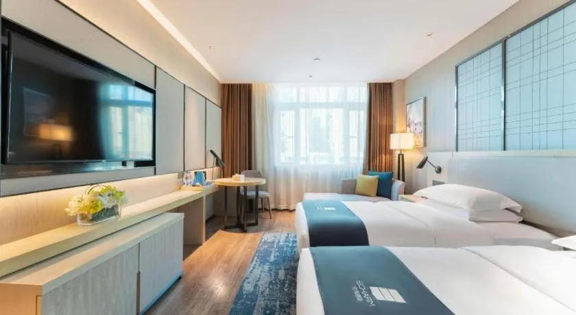 Bed in Echarm Hotel Guangzhou Changlong Shiqiao Metro Station