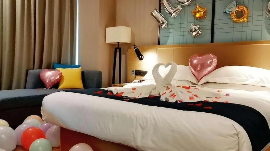 Bed in Echarm Hotel Guangzhou Tonghe Dayuan Times Square