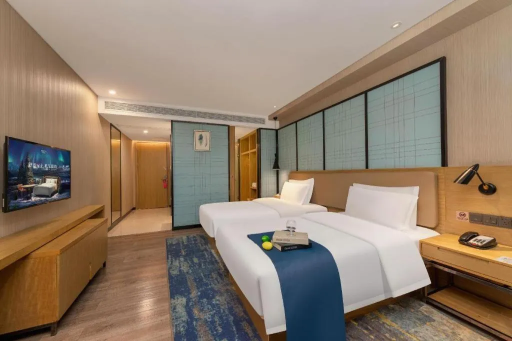 Bed in Echarm Hotel Guangzhou Tonghe Dayuan Times Square