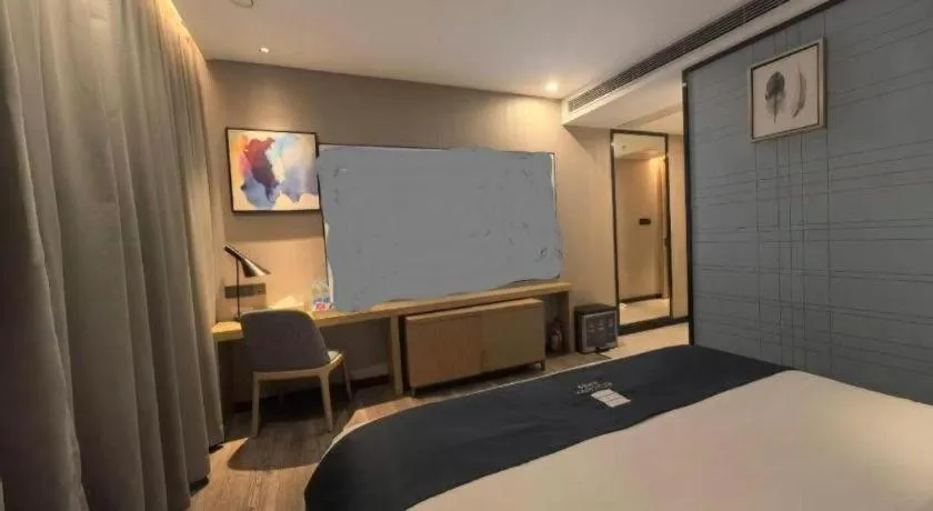 Bed in Echarm Hotel Guangzhou Tonghe Dayuan Times Square