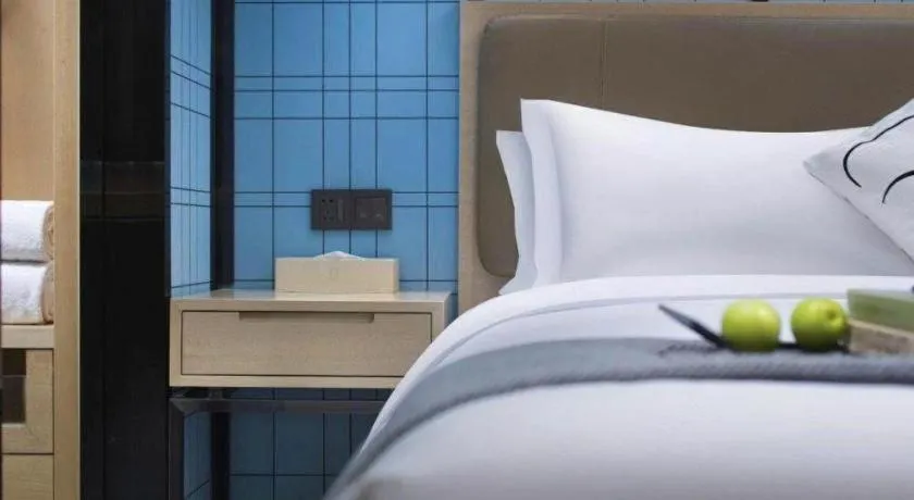 Bed in Echarm Hotel Guangzhou Tonghe Dayuan Times Square