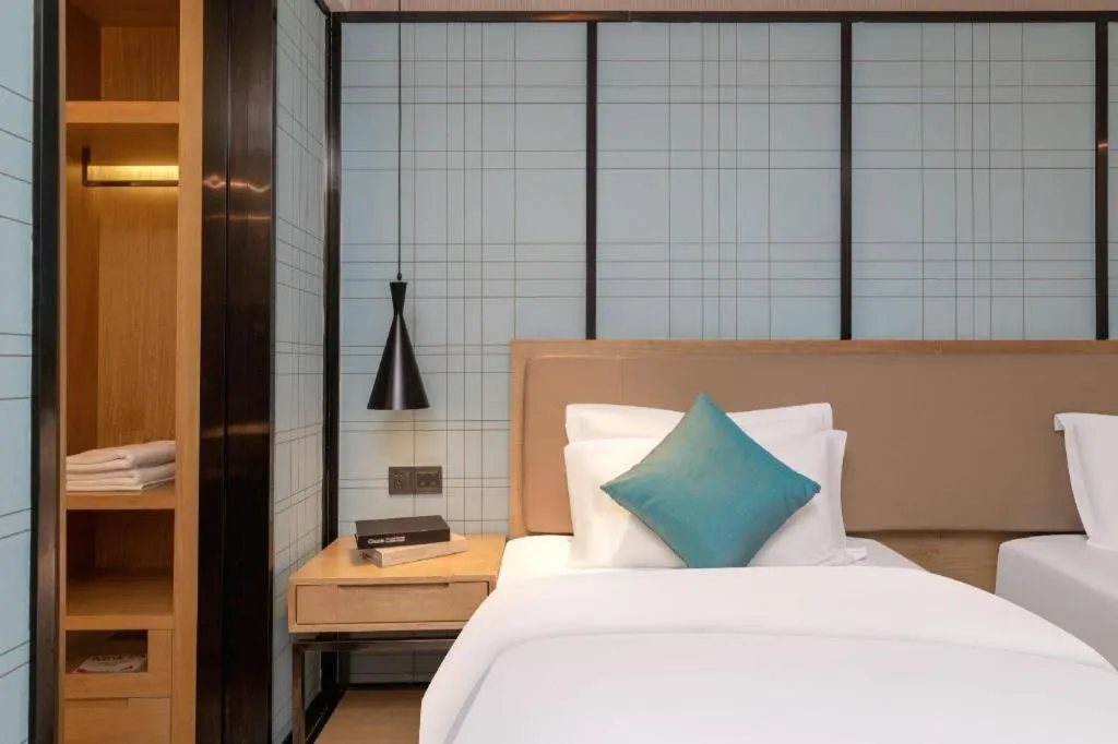 Bed in Echarm Hotel Guangzhou Tonghe Dayuan Times Square