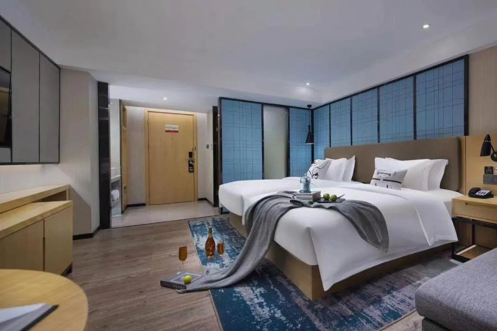 Bed in Echarm Hotel Guangzhou Tonghe Dayuan Times Square