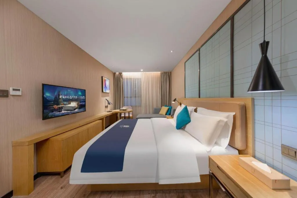 Bed in Echarm Hotel Guangzhou Tonghe Dayuan Times Square