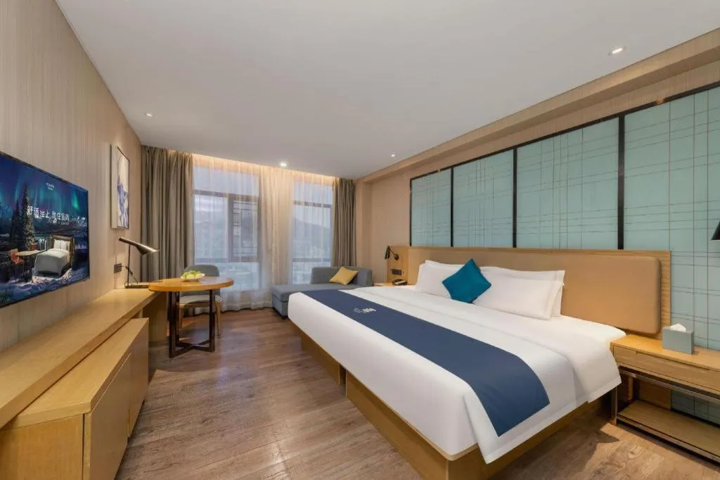 Bed in Echarm Hotel Guangzhou Tonghe Dayuan Times Square