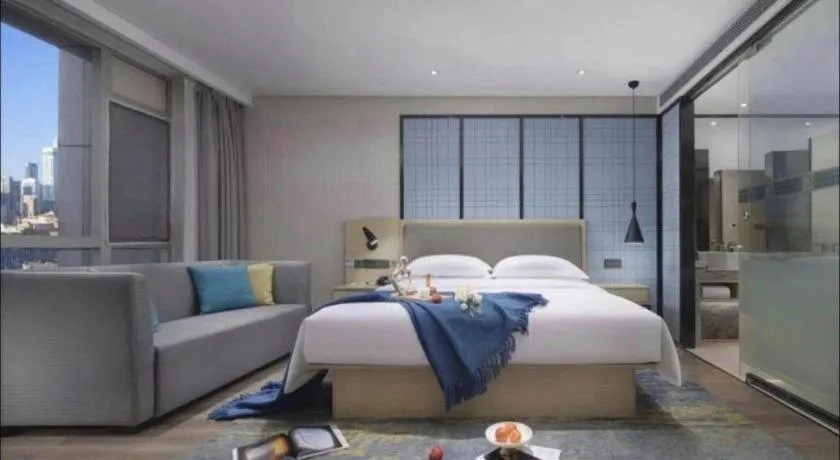 Bed in Echarm Hotel Guangzhou Tonghe Dayuan Times Square