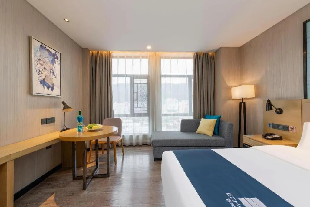 Bed in Echarm Hotel Guangzhou Tonghe Dayuan Times Square