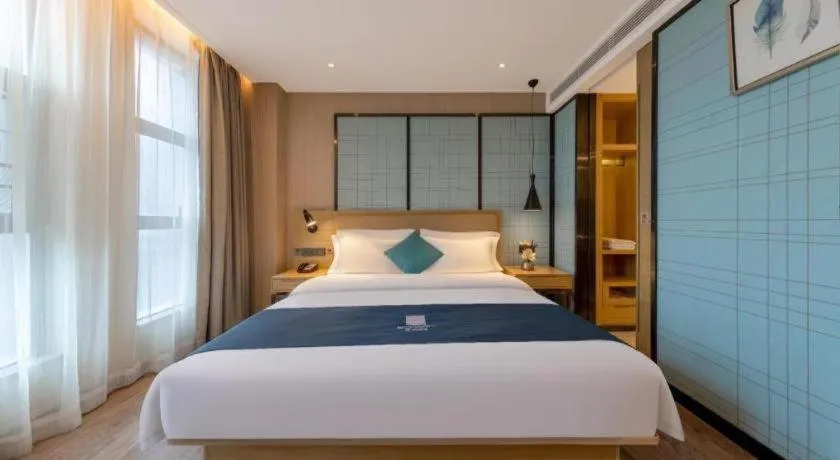 Bed in Echarm Hotel Guangzhou Tonghe Dayuan Times Square