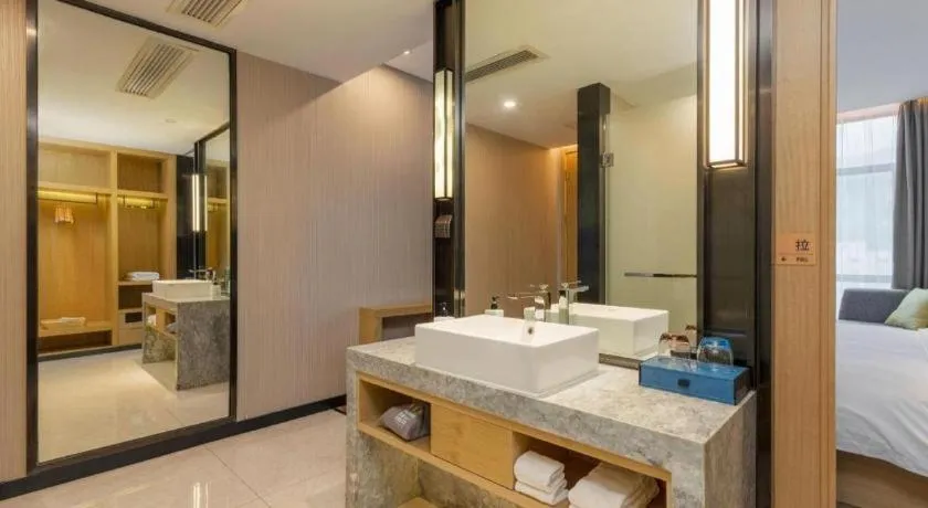 Bed in Echarm Hotel Guangzhou Tonghe Dayuan Times Square