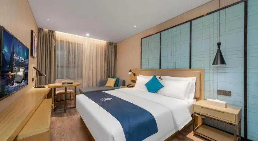 Bed in Echarm Hotel Guangzhou Tonghe Dayuan Times Square