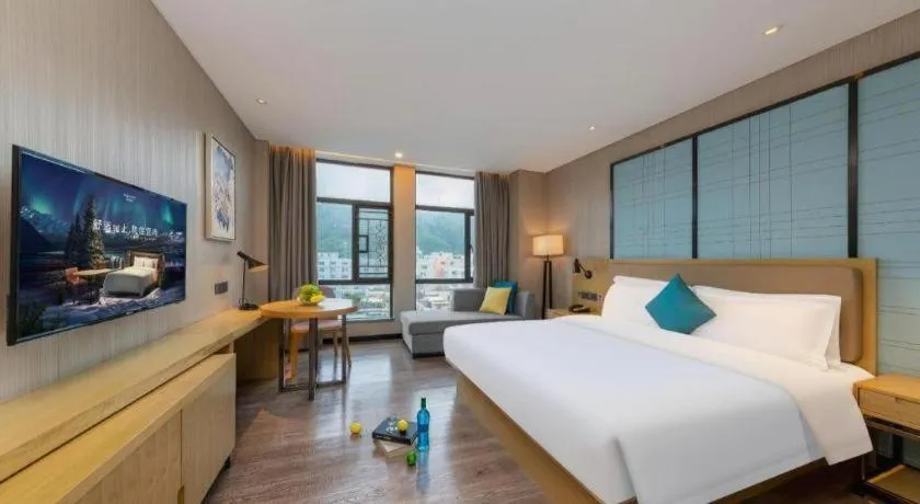 Bed in Echarm Hotel Guangzhou Tonghe Dayuan Times Square