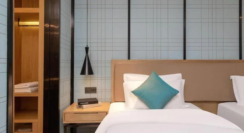 Bed in Echarm Hotel Guangzhou Tonghe Dayuan Times Square