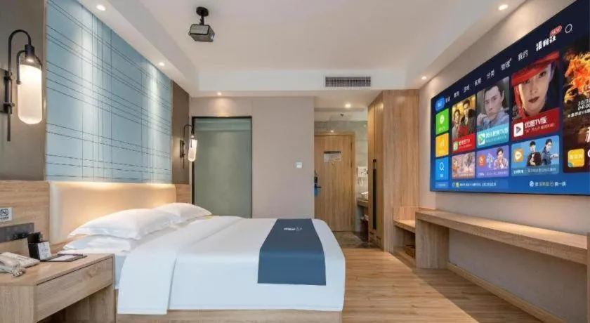 Bed in Echarm Hotel Guangzhou Tonghe Dayuan Times Square