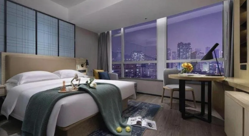 Bed in Echarm Hotel Guangzhou Tonghe Dayuan Times Square