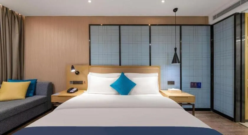 Bed in Echarm Hotel Guangzhou Tonghe Dayuan Times Square