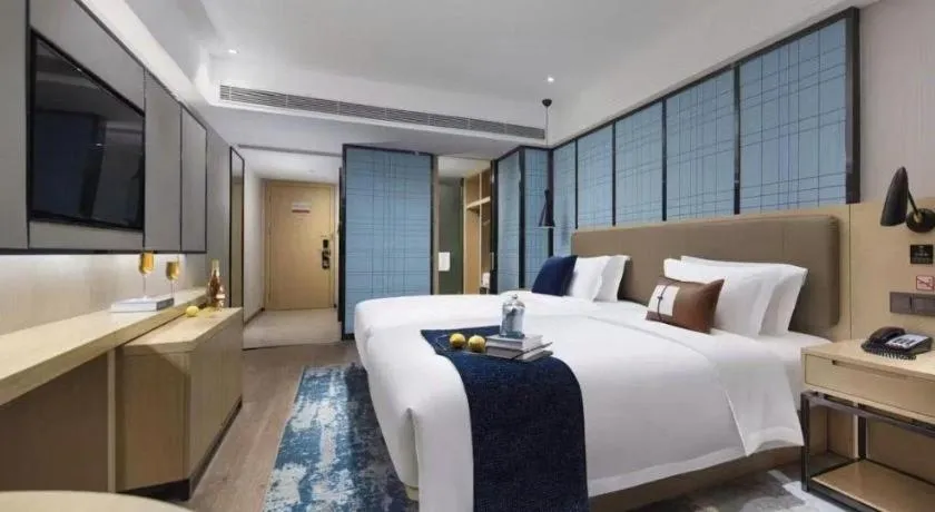 Bed in Echarm Hotel Guangzhou Tonghe Dayuan Times Square