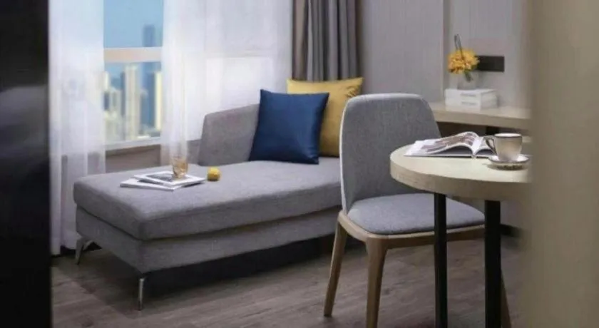 Bed in Echarm Hotel Guangzhou Tonghe Dayuan Times Square