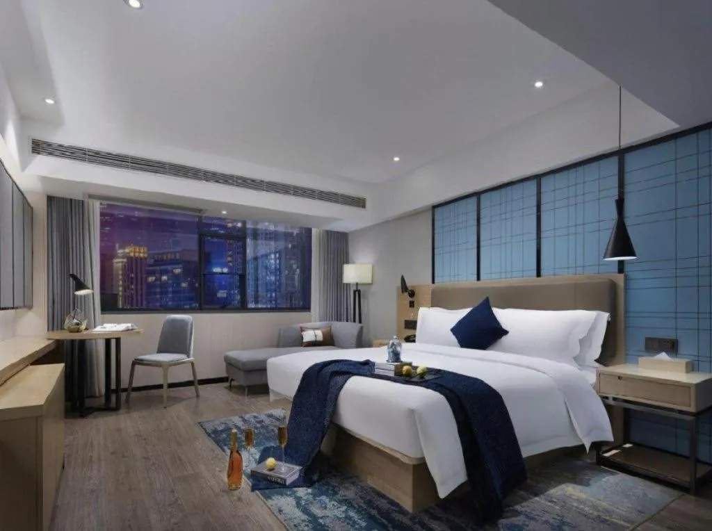 Bed in Echarm Hotel Guangzhou Tonghe Dayuan Times Square