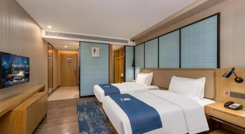 Bed in Echarm Hotel Guangzhou Tonghe Dayuan Times Square