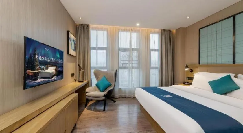 Bed in Echarm Hotel Guangzhou Tonghe Dayuan Times Square