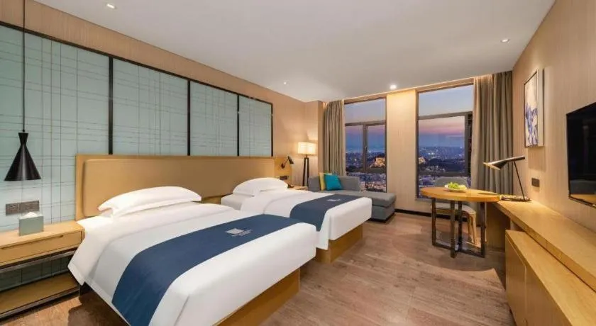 Bed in Echarm Hotel Guangzhou Tonghe Dayuan Times Square