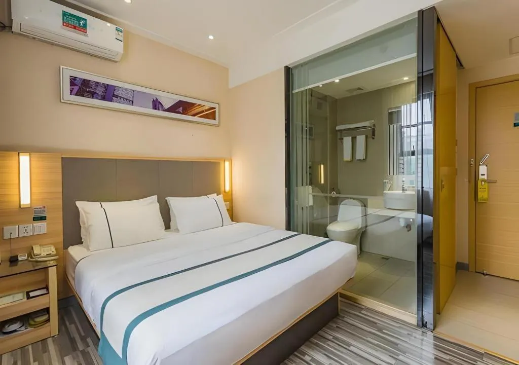 Bed in City Comfort Inn Guangzhou Tianhe District Tangxia Exhibition Center