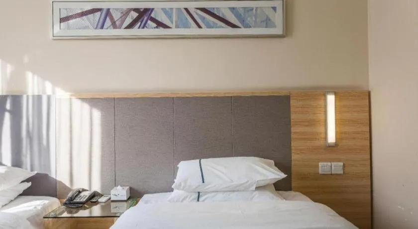 Bed in City Comfort Inn Guangzhou Tianhe District Tangxia Exhibition Center