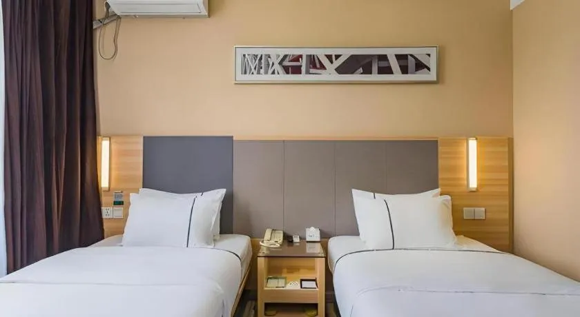 Bed in City Comfort Inn Guangzhou Tianhe District Tangxia Exhibition Center