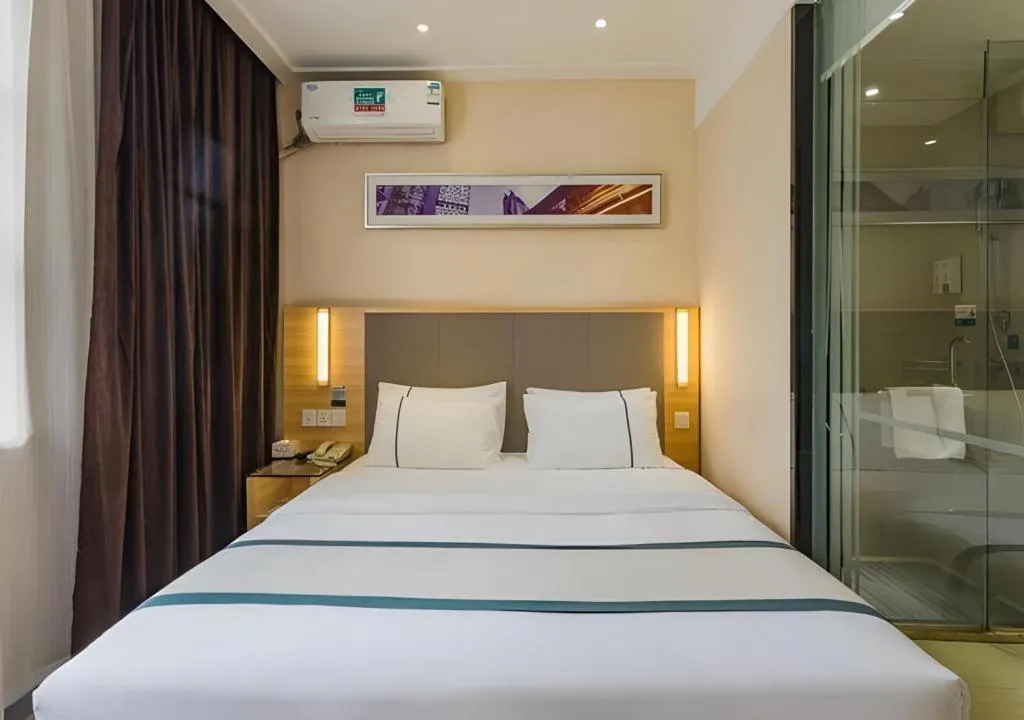 Bed in City Comfort Inn Guangzhou Tianhe District Tangxia Exhibition Center