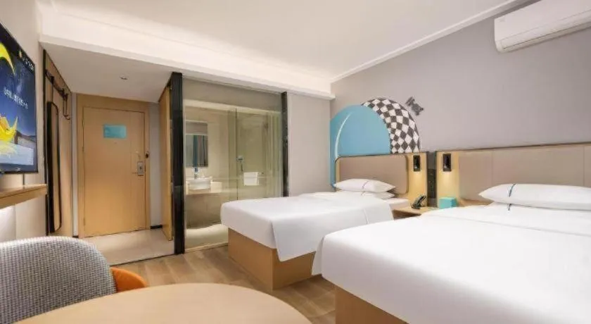 Bed in City Comfort Inn Wuhan Jinyinhu Garden Expo Park