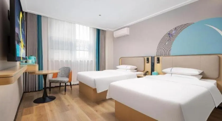 Bed in City Comfort Inn Wuhan Jinyinhu Garden Expo Park