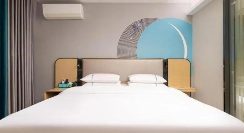 Bed in City Comfort Inn Wuhan Jinyinhu Garden Expo Park