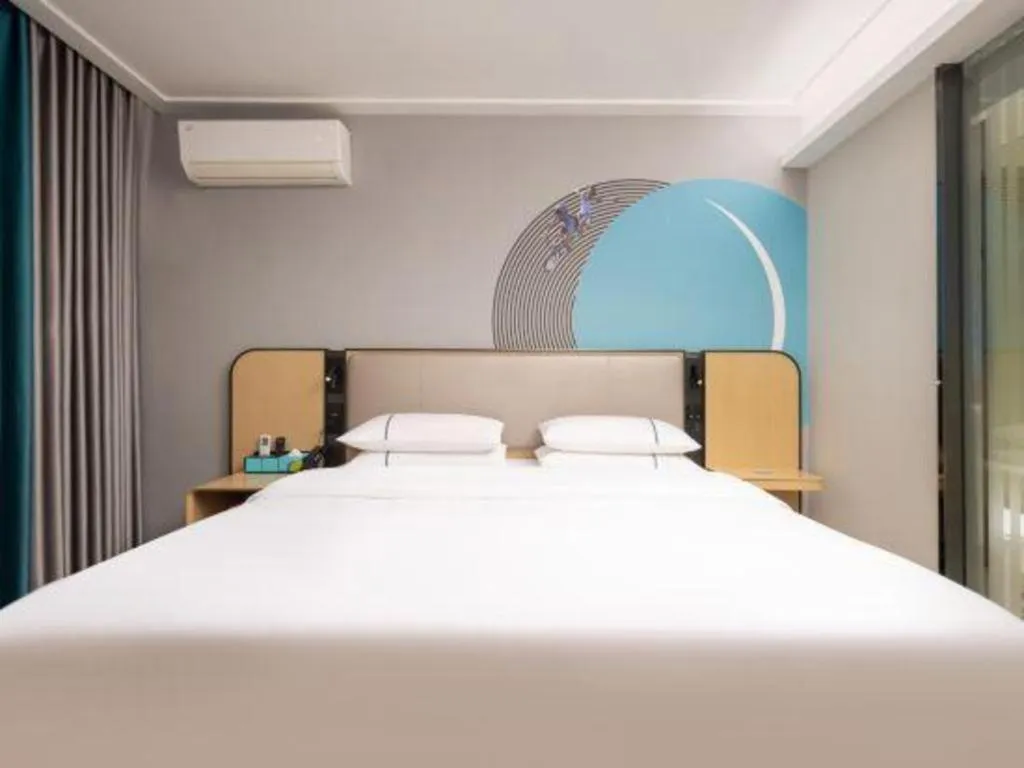Bed in City Comfort Inn Wuhan Jinyinhu Garden Expo Park
