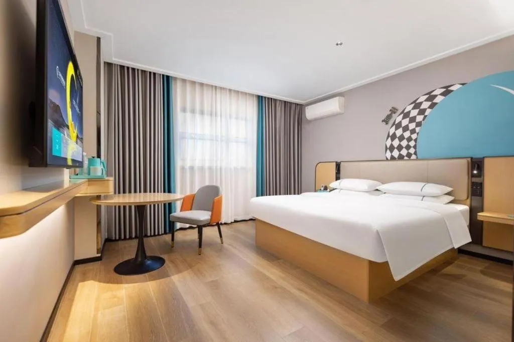 Bed in City Comfort Inn Wuhan Jinyinhu Garden Expo Park