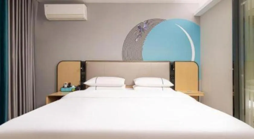 Bed in City Comfort Inn Wuhan Jinyinhu Garden Expo Park