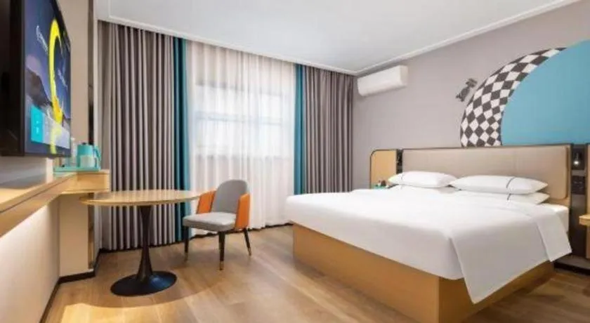 Bed in City Comfort Inn Wuhan Jinyinhu Garden Expo Park