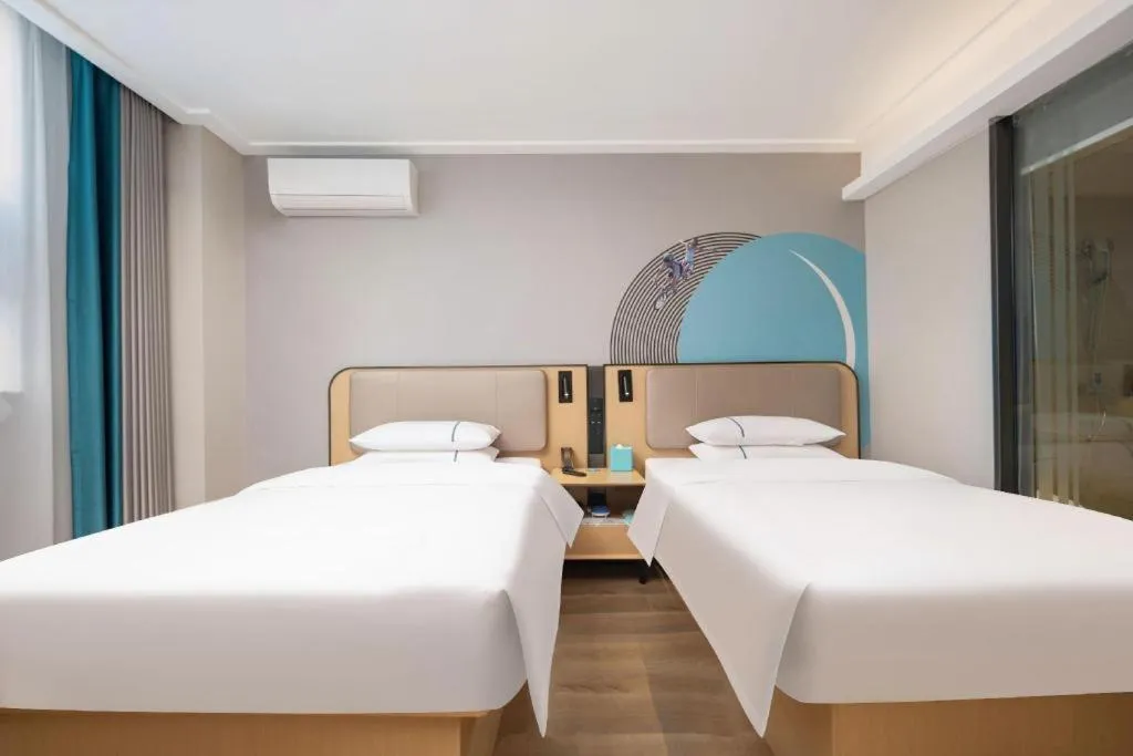 Bed in City Comfort Inn Wuhan Jinyinhu Garden Expo Park