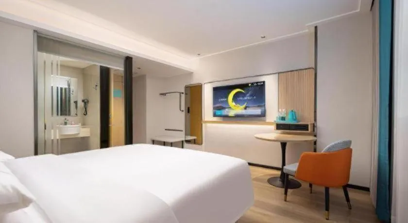 Bed in City Comfort Inn Wuhan Jinyinhu Garden Expo Park