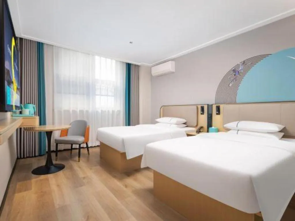 Bed in City Comfort Inn Wuhan Jinyinhu Garden Expo Park