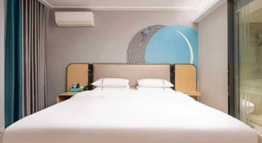 Bed in City Comfort Inn Wuhan Jinyinhu Garden Expo Park