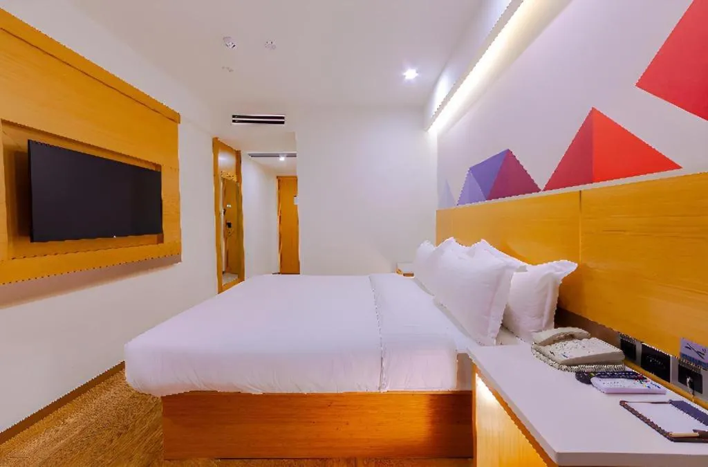 Bed in Borrman Hotel Zhanjiang Shimao Building High-speed Railway Station