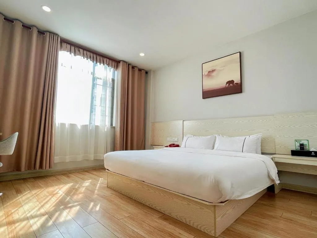Bed in Jtour Inn Fengcheng Railway Station Jianyi Avenue Xincheng